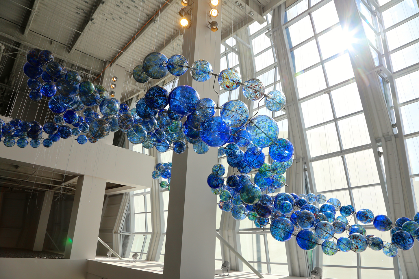 Multitudes Converge | 22' X 36' X 55' | Glass, Stainless Steel, Silicon | 2016 || Photo by Joan Cusick
